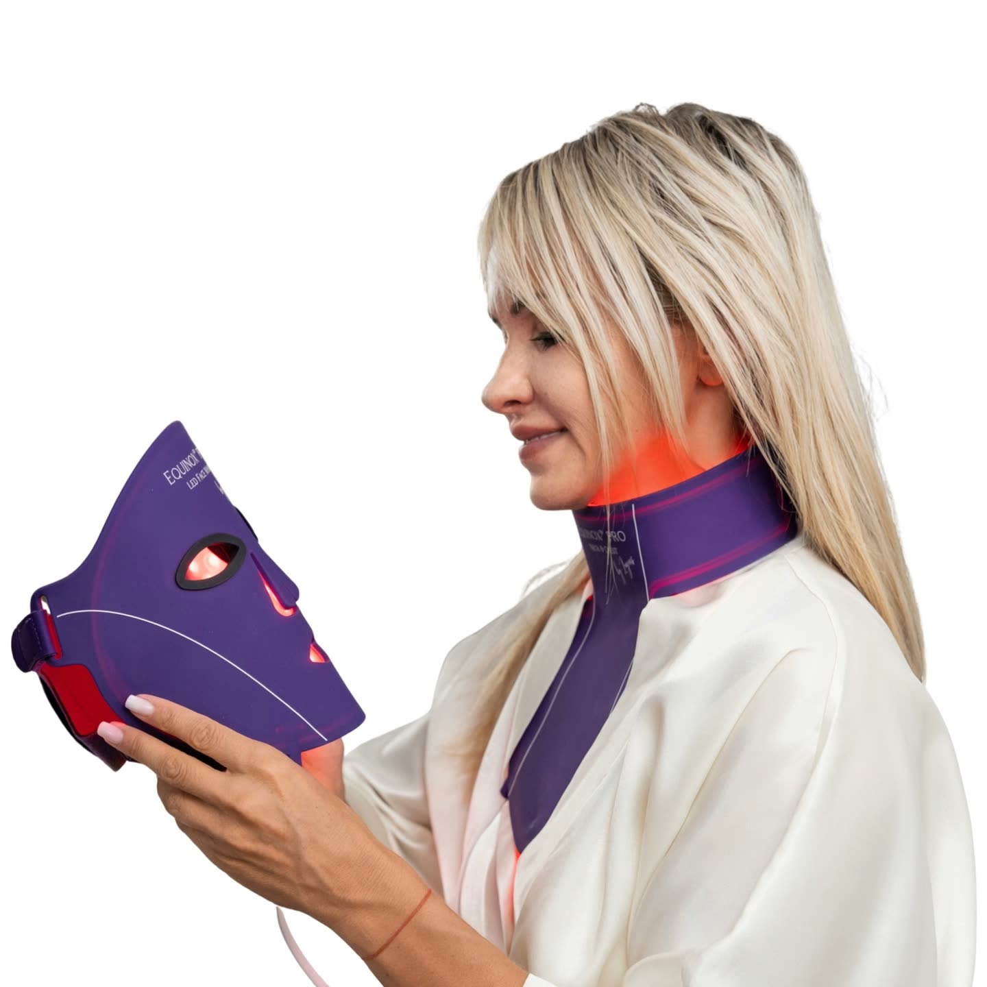 Luyors Equinox Pro LED Therapy Face, Neck and Chest mask held by a woman, showing the mask's front panel of 656 medical-grade LEDs
